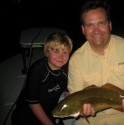 Colin and Hugh Lindsay had a great night fishing the lights!  Colin caught the reddest redfish I've ever seen and Hugh caught some beautiful trout!